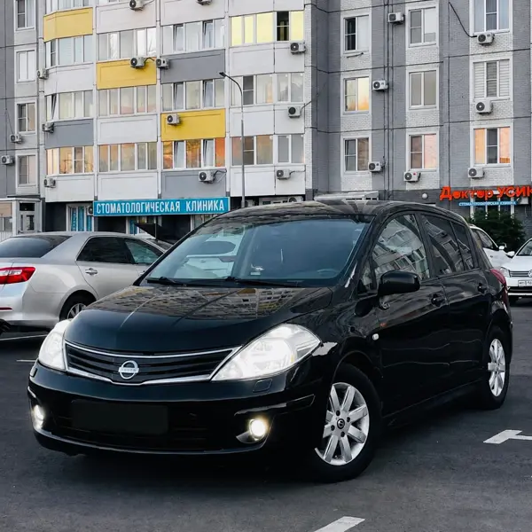 Nissan Tiida рестайлинг 2013 год