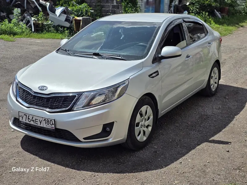 Kia Rio III 2013 год