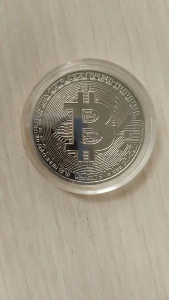 Монета Биткоина